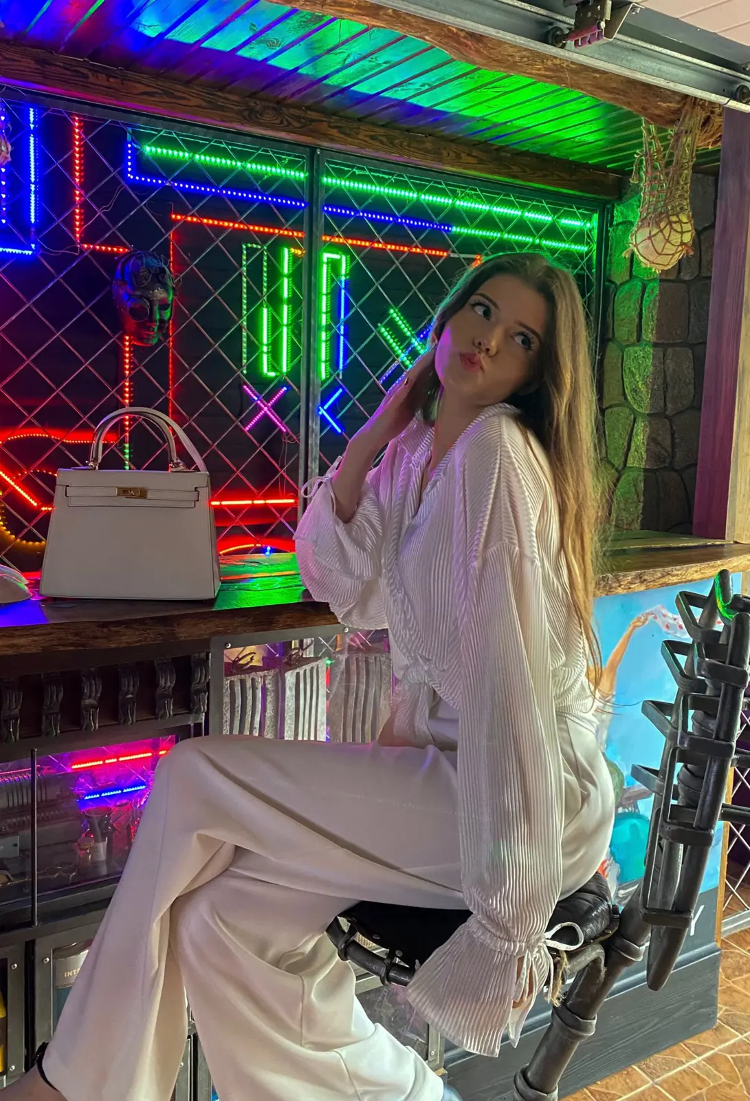 Kseniya Savitskaya in a colorful setting